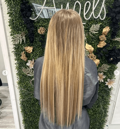 A woman with colored, straight hair